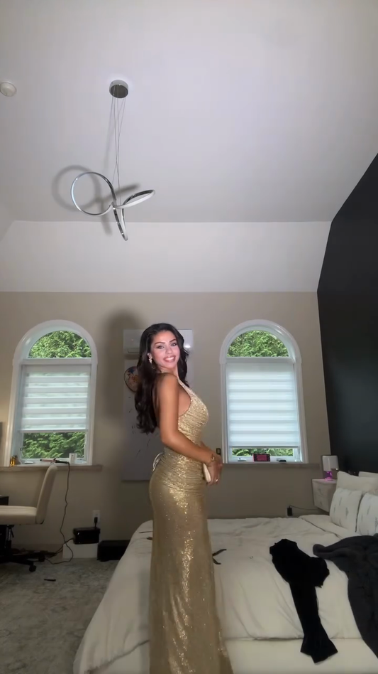 Gold sequined halterneck maxi dress
