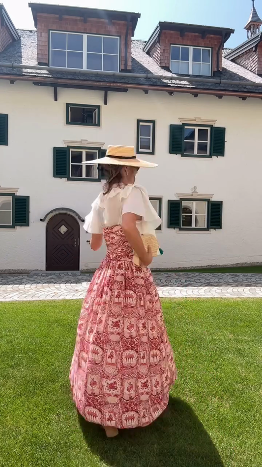 White Ruffled Top And Red Printed Maxi Skirt