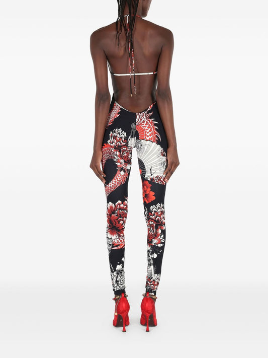 Black halterneck jumpsuit with oriental print